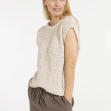 Sleeveless sweater w/ open-knit