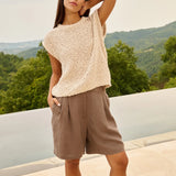 Sleeveless sweater w/ open-knit
