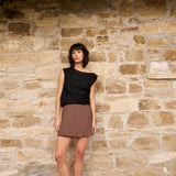 Sleeveless top w/twist shoulder